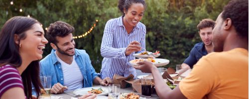 Friends eating outdoors