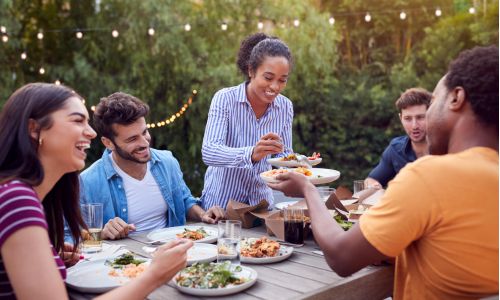 Friends eating outdoors